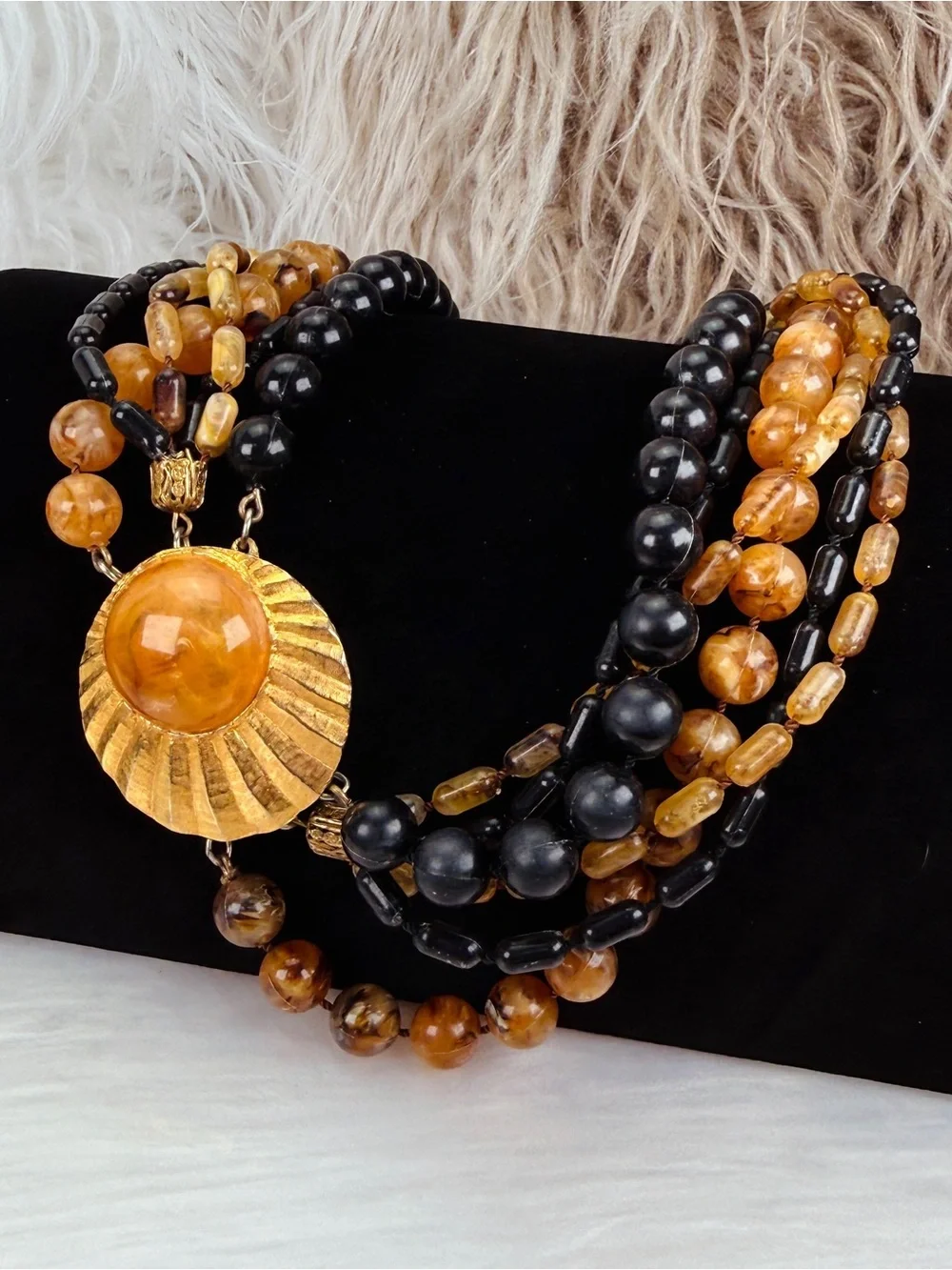 Vintage Multi Strand Black Amber Tone Bead Necklace Gold Tone Centerpiece